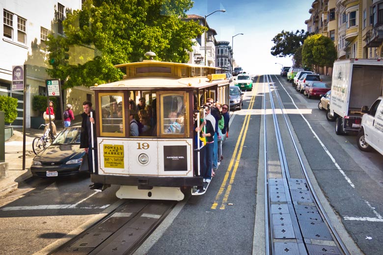 Riding the cable car, San Francisco, California, USA